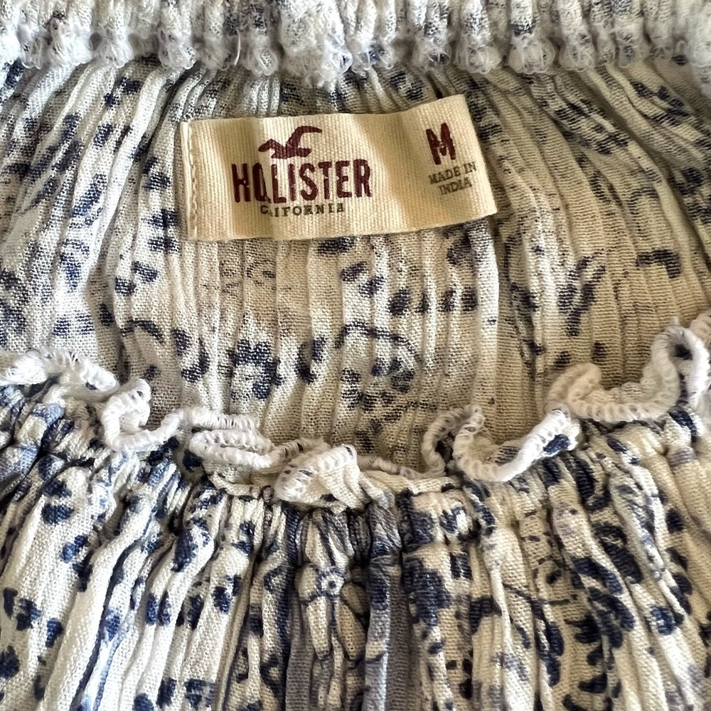 Hollister blouse, size M, off the shoulder, blousy sleeves, tie bottom.